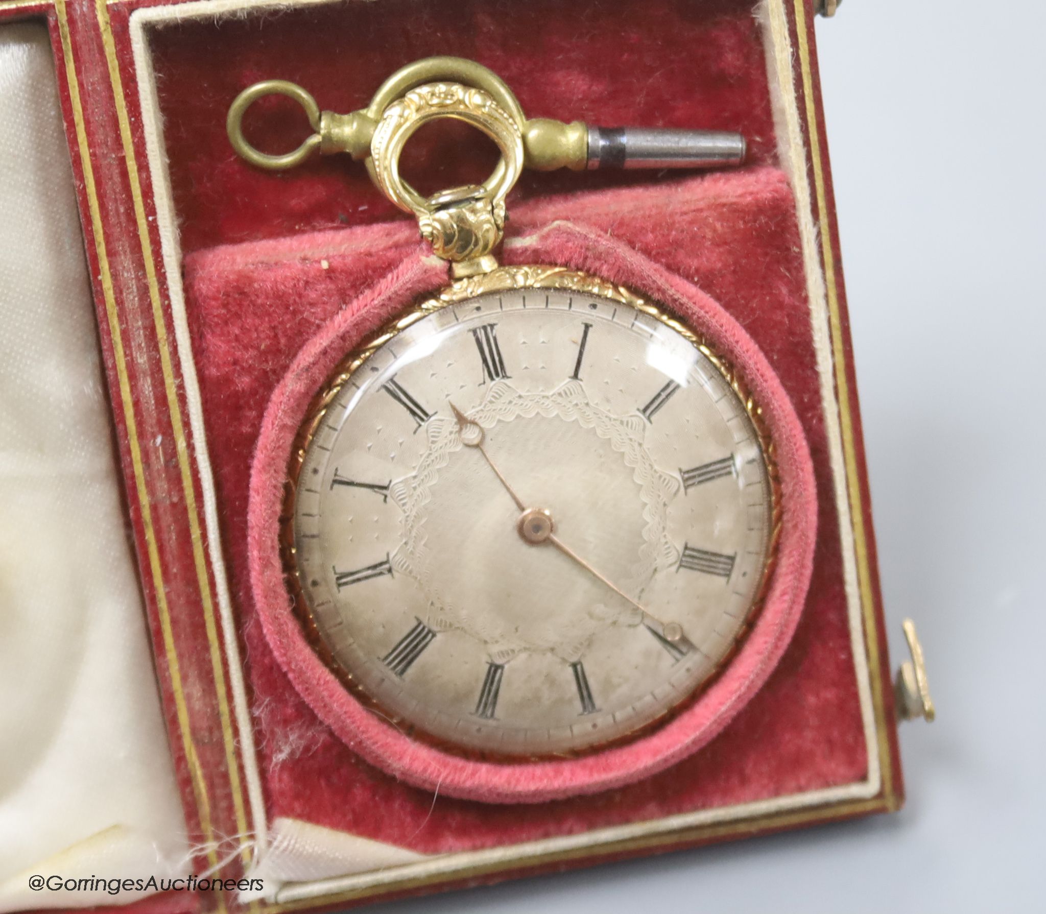 A Swiss cased 19th century engine turned yellow metal open face keywind fob watch, with silvered Roman dial